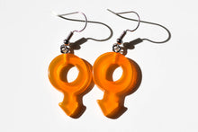 Load image into Gallery viewer, orange boy symbol clear earrings
