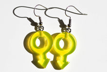 Load image into Gallery viewer, yellow boy symbol clear earrings
