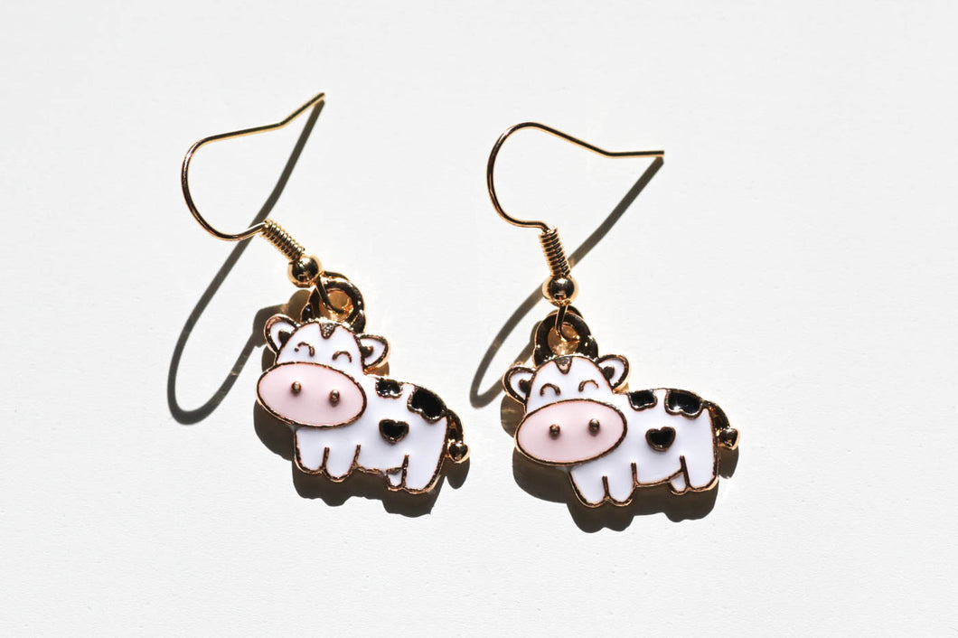 cow charm earrings