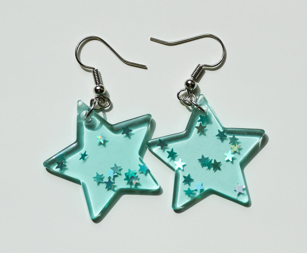 blue glitter star earrings