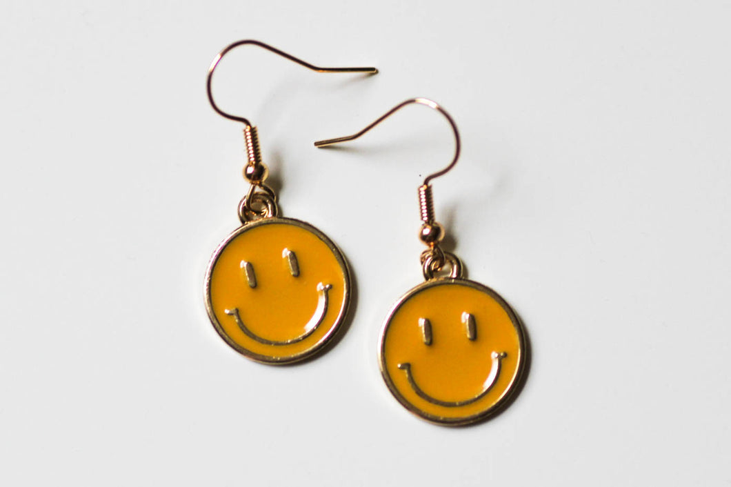 smiley face earrings yellow